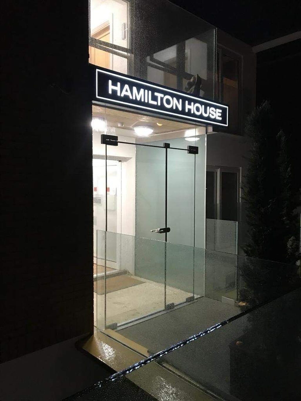 A frameless glass porch offers discreet protection from the elements without disrupting the clean lines of your entrance. Ideal for high-spec homes, it provides practical shelter while maintaining a minimalist, architectural finish. Designed to suit each property with precision. #frameless #architecture #glass