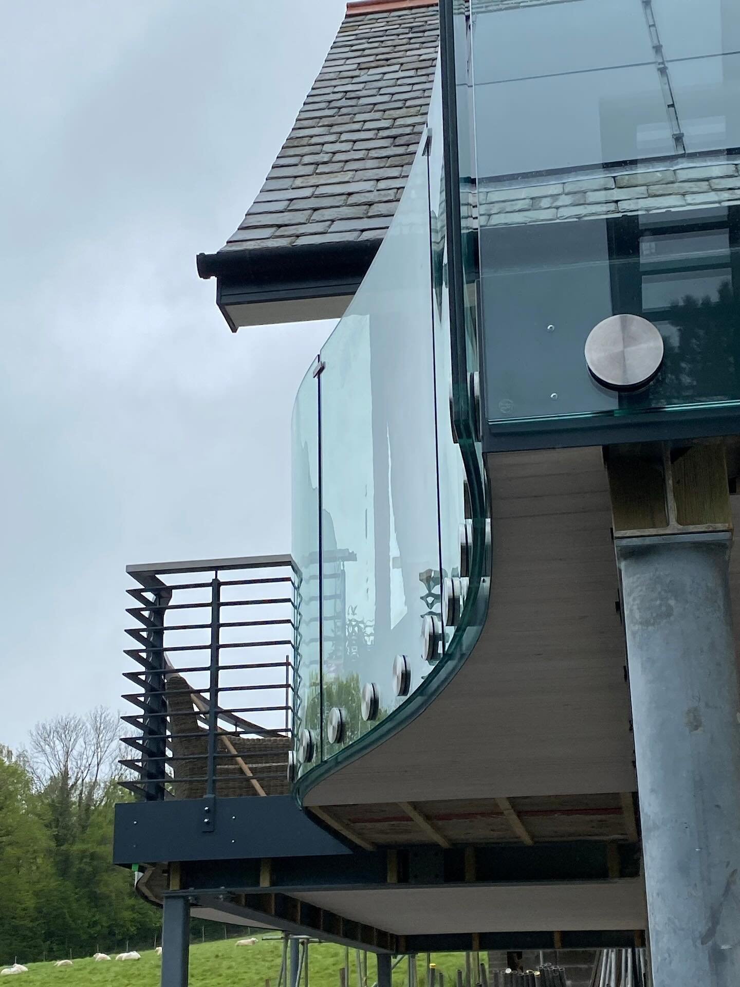 Maximise light and floor area with a side-fixed glass balustrade. This minimalist solution keeps your space feeling open while providing secure protection at height. Ideal for balconies, terraces, and internal landings where clean lines and uninterrupted views matter. Designed to suit your project exactly. #GlassBalustrade #ArchitecturalGlazing #FramelessDesign #BalconyDesign #ModernArchitecture