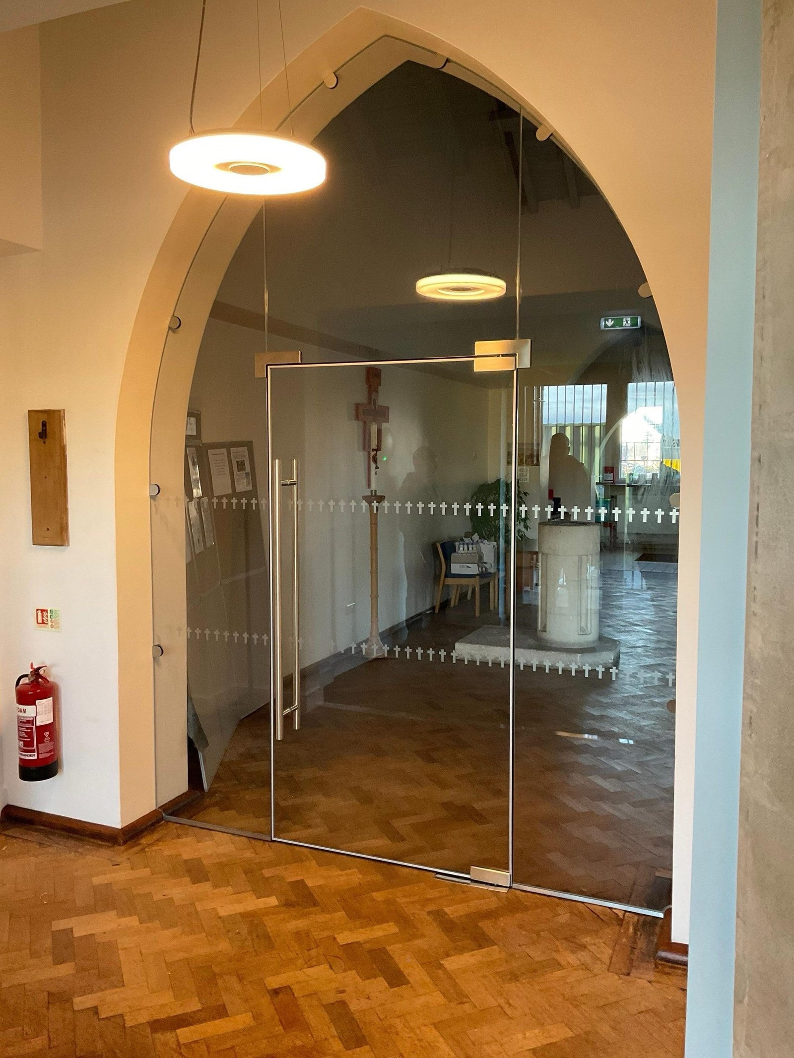 Whilst frameless glazing makes the church feel more welcoming, it must be safe. This is where manifestation plays its part.Manifestation plays an important role in ensuring large areas of glass at floor level are clearly visible, helping visitors of all ages move safely through entrance lobbies and partitions. In churches and heritage buildings particularly, the challenge is to achieve compliance without distracting from the architectural character.Thoughtful detailing allows manifestation to sit comfortably within traditional or contemporary designs. From subtle etched bands to bespoke patterns that reflect ecclesiastical features, glass can be both compliant and visually appropriate.When carefully considered, safety requirements do not detract from the space. They quietly support it.#ArchitecturalGlass #ChurchDesign #HeritageArchitecture #GlassManifestation #BuildingRegulation