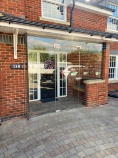 Planning a new front porch? A little early thinking can prevent costly changes later.Before finalising the design, it’s worth considering whether Building Regulations approval will be required, and if planning permission applies in your area. Early clarity here helps avoid delays once work is underway.Just as important are the practical details. Are there suitable structural fixing points for a frameless glass porch to be securely installed? Has future access been considered for moving large furniture in and out? Small dimensional decisions now can make a significant difference long term.Finishes also deserve attention. Ironmongery, thresholds and surrounding materials should all work cohesively with the wider façade.A porch should feel effortless once completed. That usually comes down to careful thought at the beginning.#FramelessGlass #GlassPorch #ArchitecturalGlass #BespokeGlazing #LuxuryHomes SelfBuildUK ResidentialArchitecture HighEndHomes ConstructionUK ArchitecturalDetail