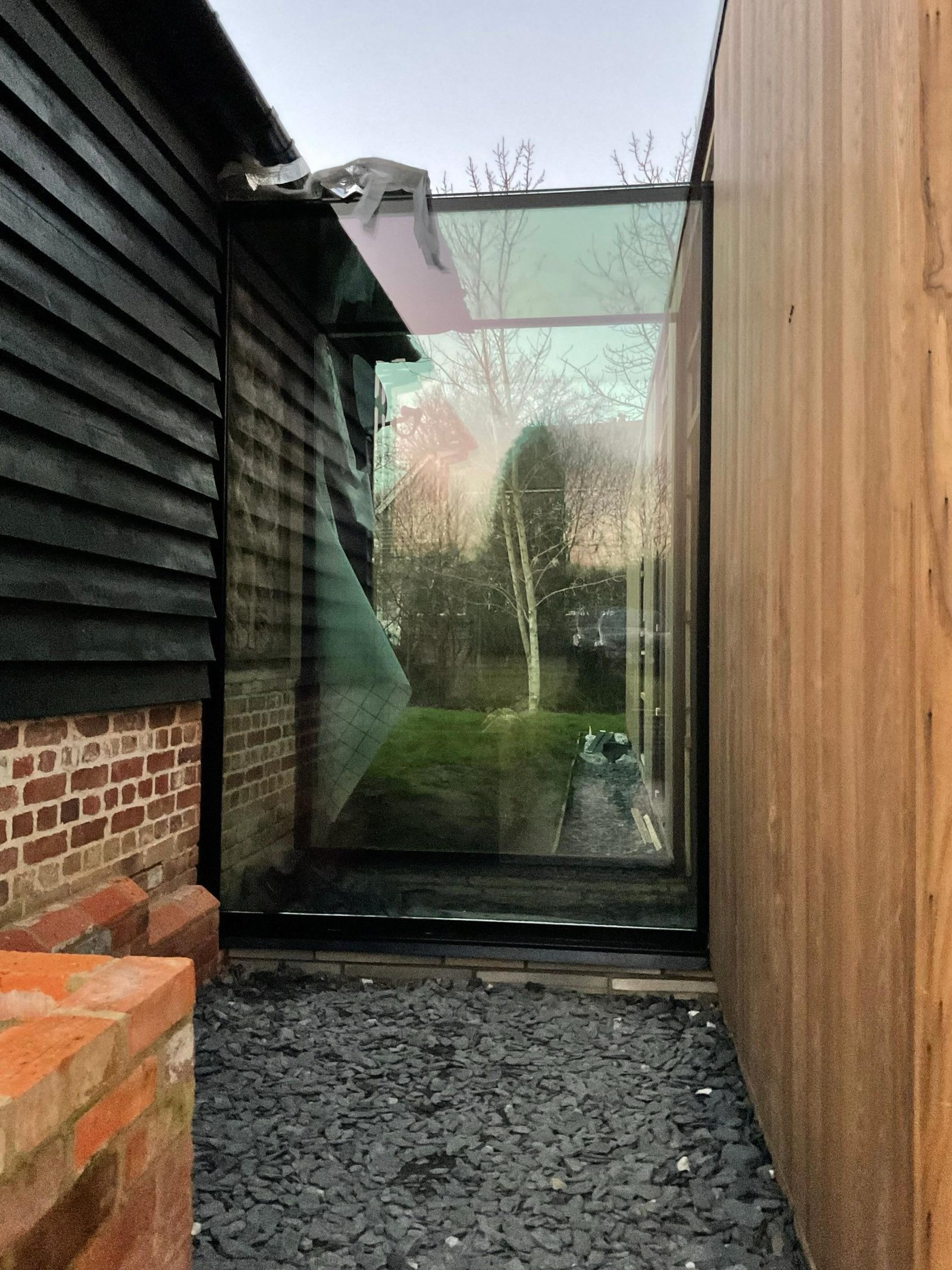 Does a glazed link get hot?It is a common concern, particularly when a link is largely formed in glass and exposed to direct sunlight.In reality, overheating is not inevitable. Solar gain can be carefully managed through considered design. This may include high performance solar control glazing and Low-E coatings.Orientation, roof pitch and the proportion of solid to glazed elements also play an important role. A well designed glazed link should feel light and transparent without becoming uncomfortable during warmer months.When addressed early in the design stage, a glass link can provide openness and daylight without compromising comfort.#GlazedLink #StructuralGlass #ArchitecturalGlazing #GlassArchitecture #BespokeGlazing HighEndHomes ArchitecturalDetailing GlassDesign PremiumResidential DesignWithGlass